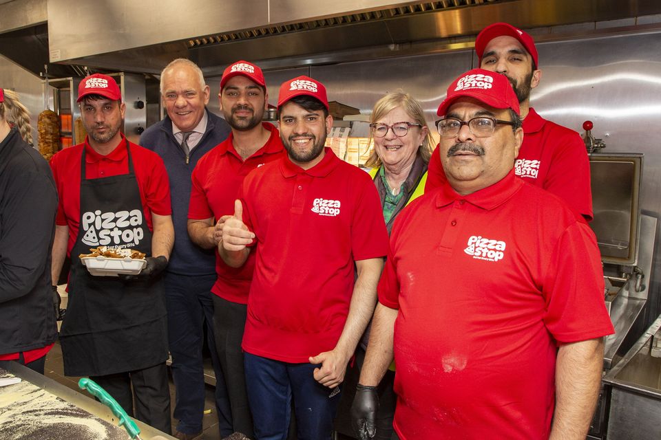 Ihtisham Khan with his staff, Deputy Brian Brennan and Sandra Hall of Arklow Tidy Towns at the official opening of Pizza Stop on Main Street in Arklow. Photo: Mihael Kelly